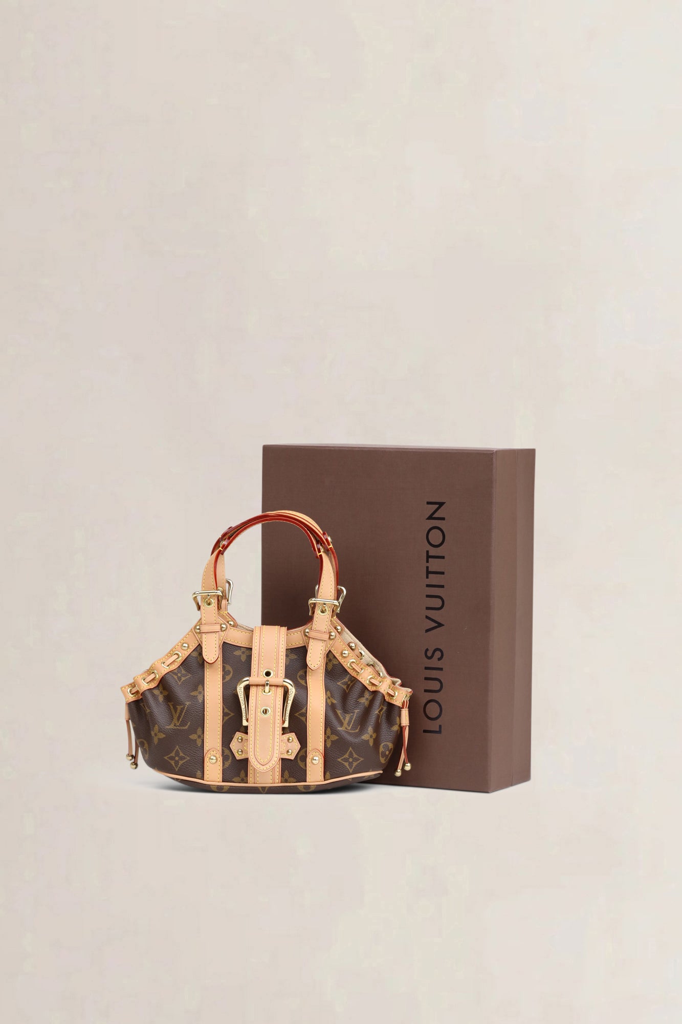 Theda Monogram PM Top Handle Bag