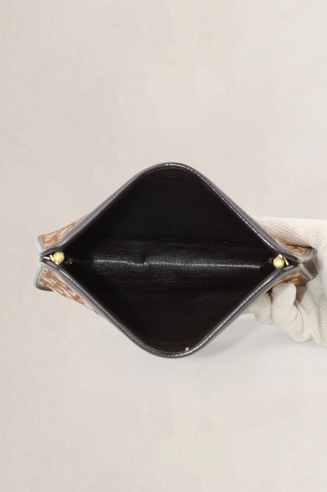 Brown Oblique Monogram Clutch