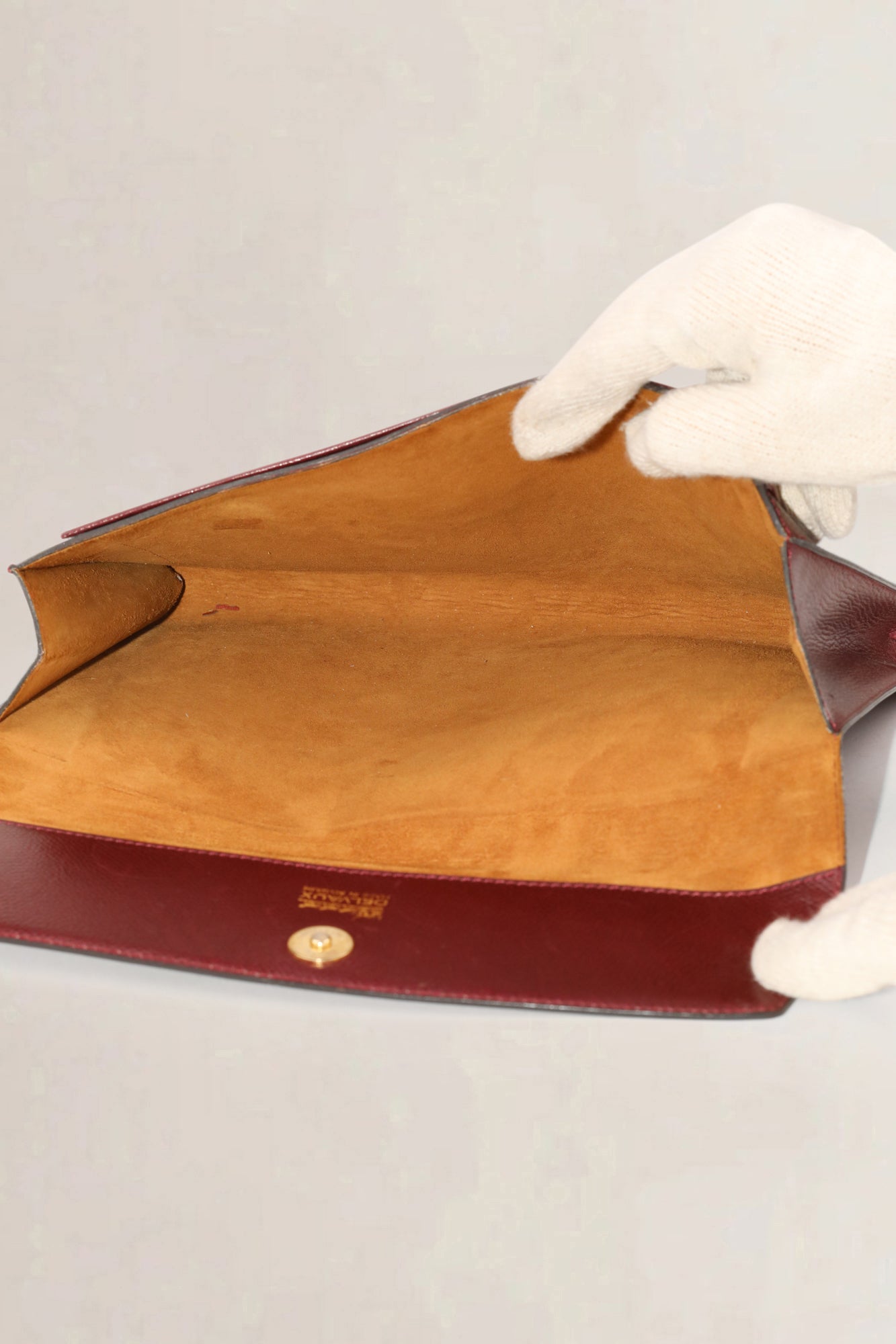 Delvaux Burgundy leren clutch