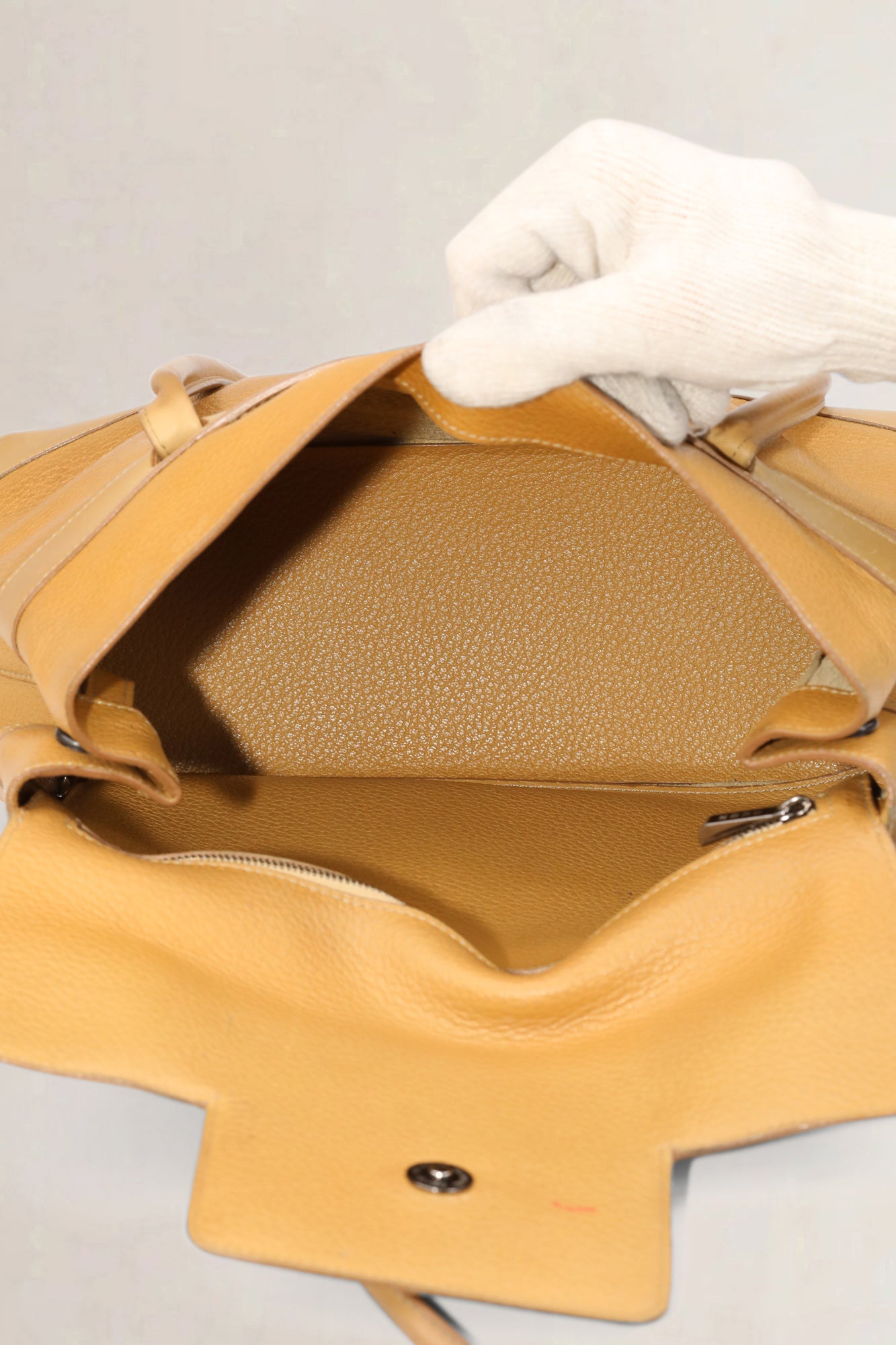 Deux de Delvaux beige tas met handvat aan de bovenkant