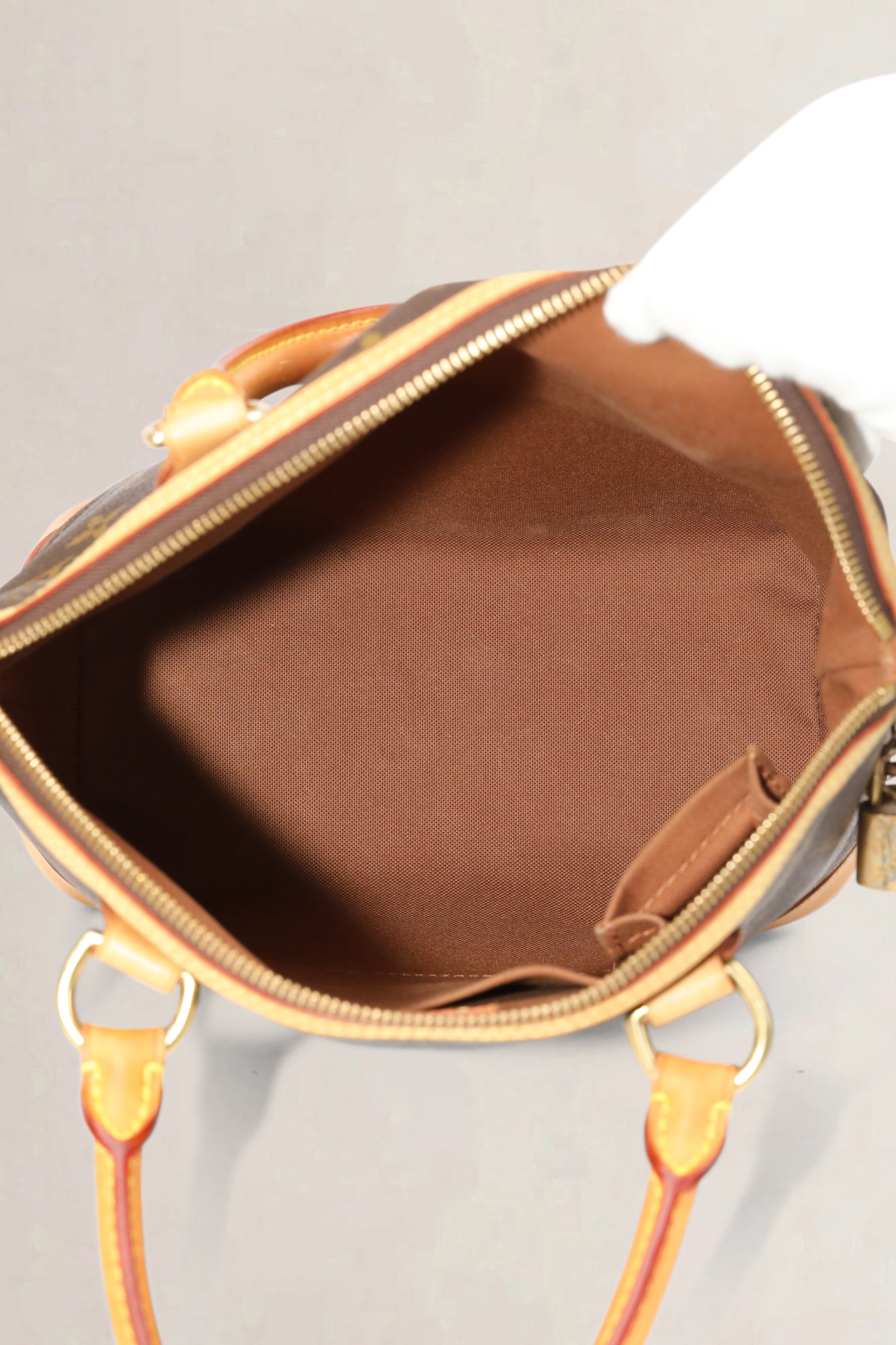 Louis Vuitton Lockit-tas met handgreep aan de bovenkant