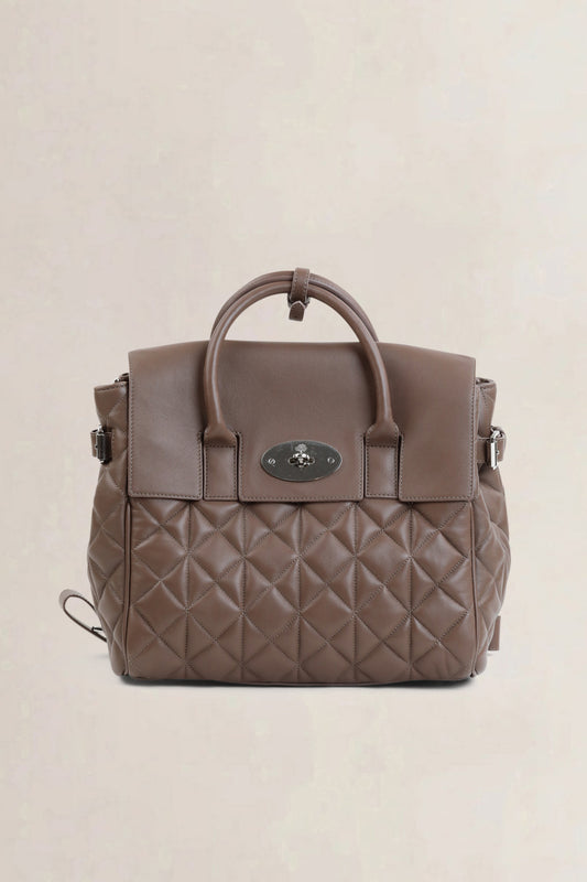 Brown Quilted Cara Delevingne Backpack