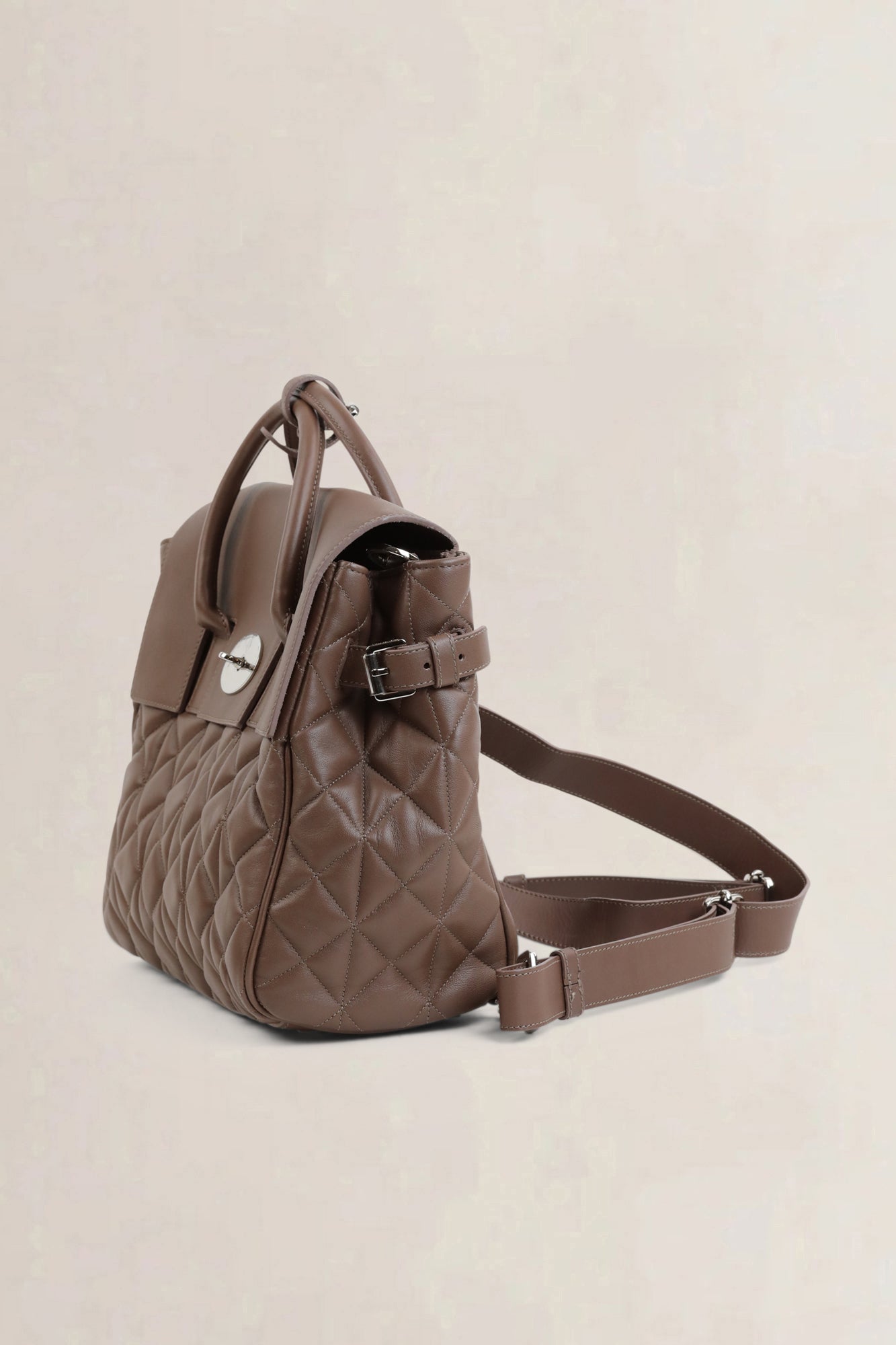 Brown Quilted Cara Delevingne Backpack