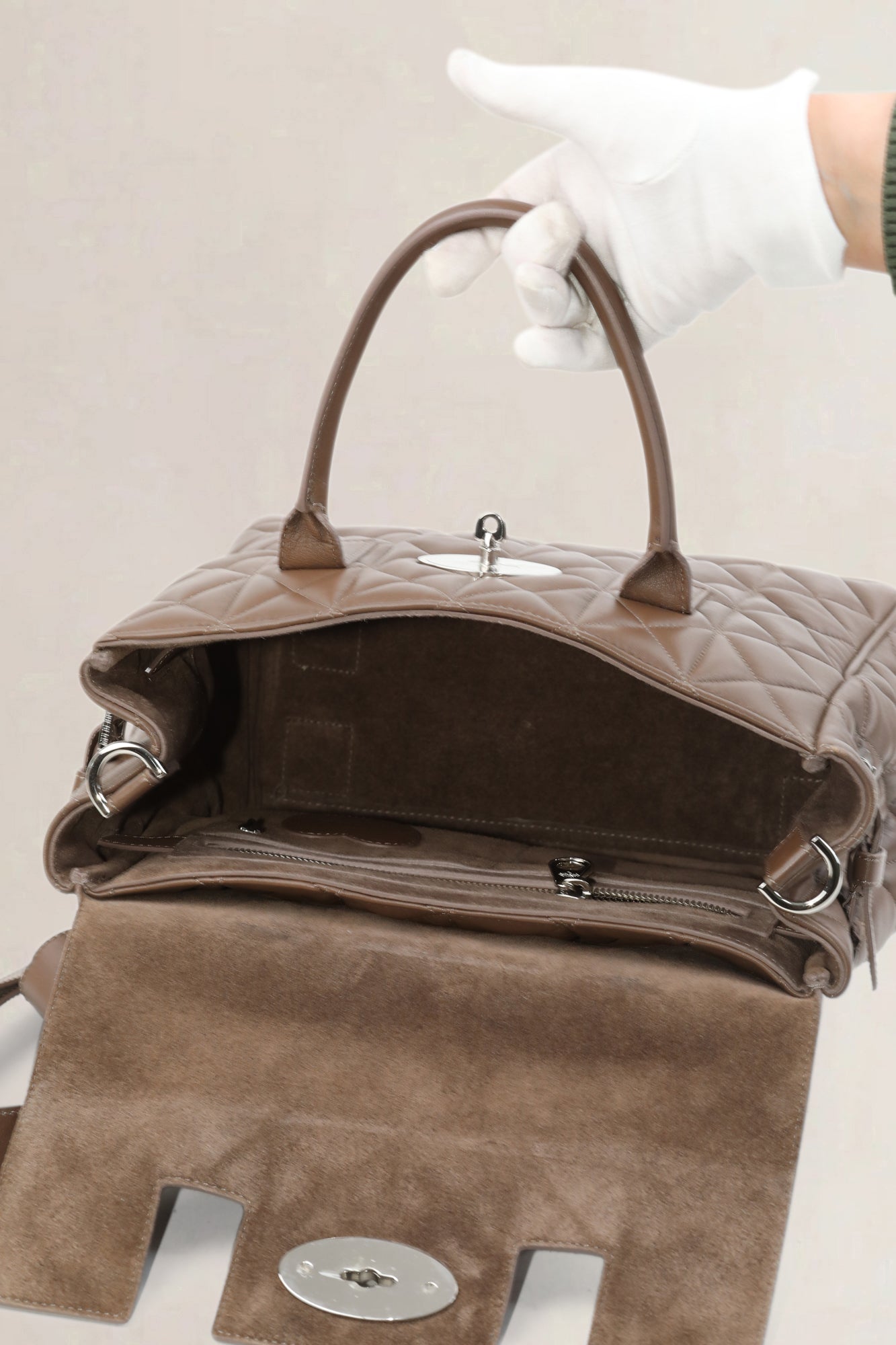Brown Quilted Cara Delevingne Backpack