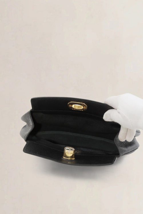 Delvaux Black Turn Lock Clutch