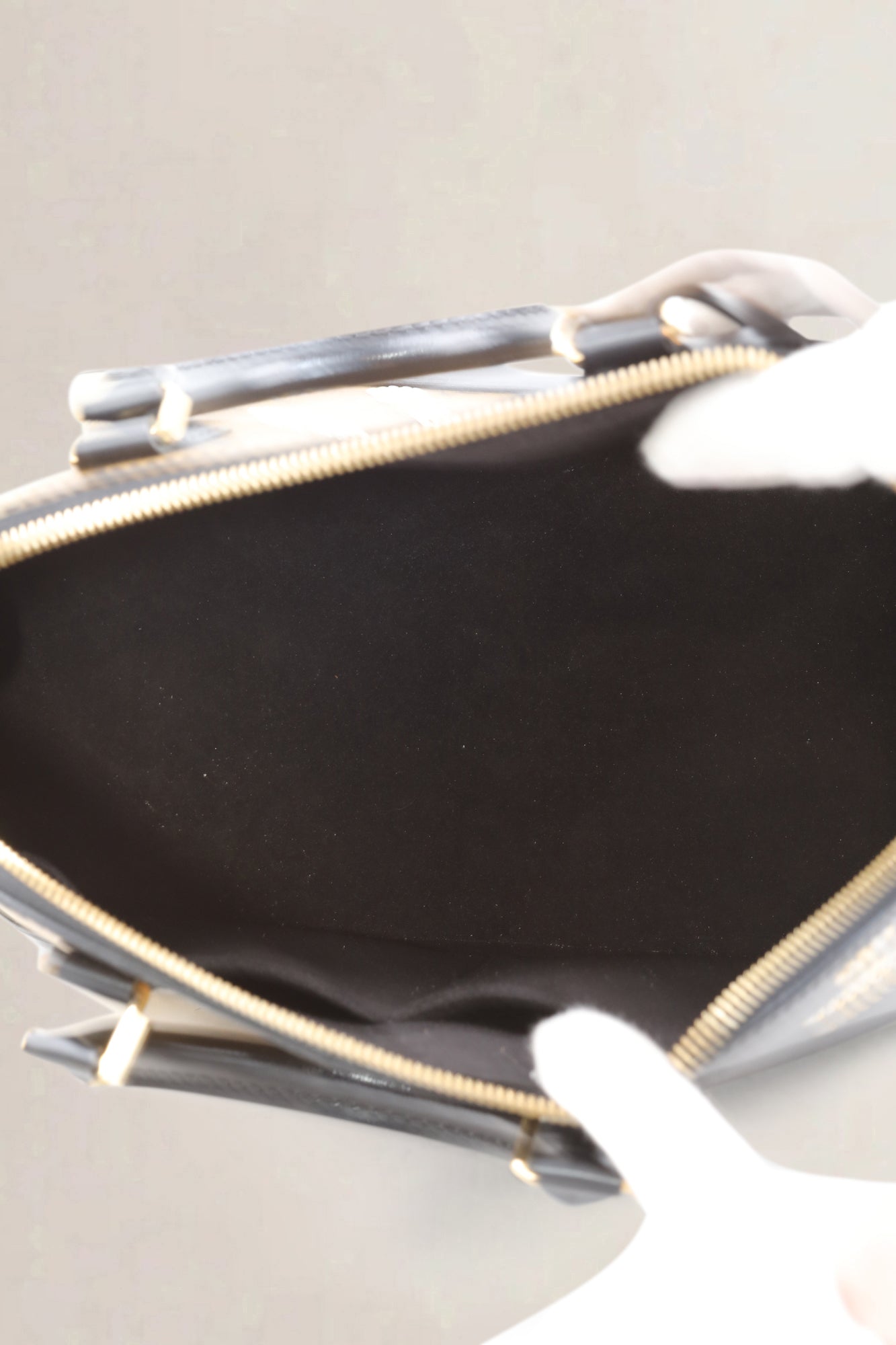 Reverse Monogram Night Lights Alma Top Handle Bag