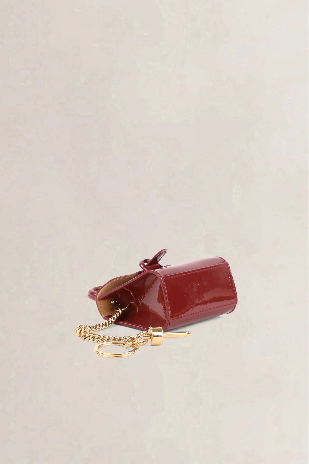 Delvaux Burgundy Vernis Brillant Bag Charm