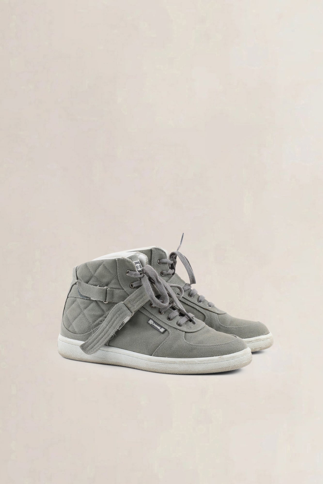 Chanel grey quilted cloth sneakers — preloved