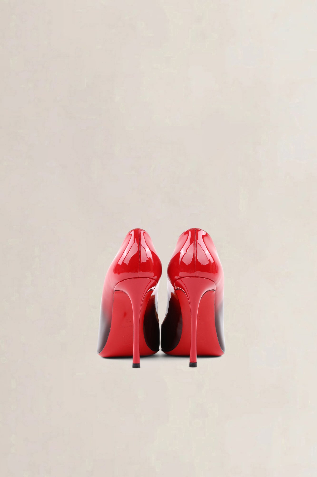 Christian Louboutin red black gradient pumps — preloved
