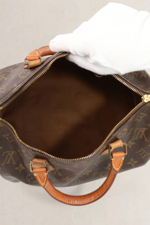 Louis Vuitton Classic Monogram Speedy 25 Top Handle Bag