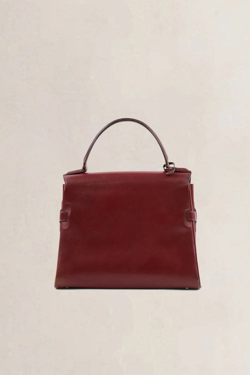 Sac top handle Delvaux Tempête en cuir Box Calf bordeaux