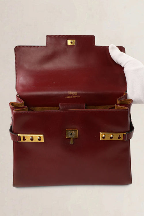 Sac top handle Delvaux Tempête en cuir Box Calf bordeaux