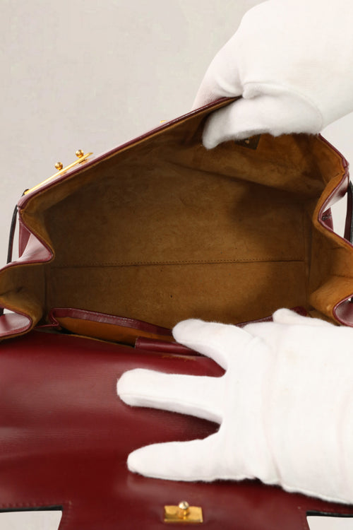 Sac top handle Delvaux Tempête en cuir Box Calf bordeaux
