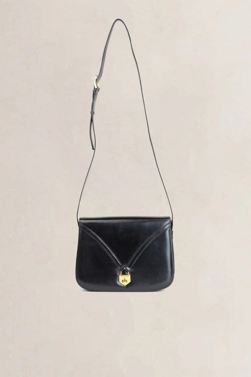 Sac à bandoulière vintage Céline en cuir noir avec fermoir doré