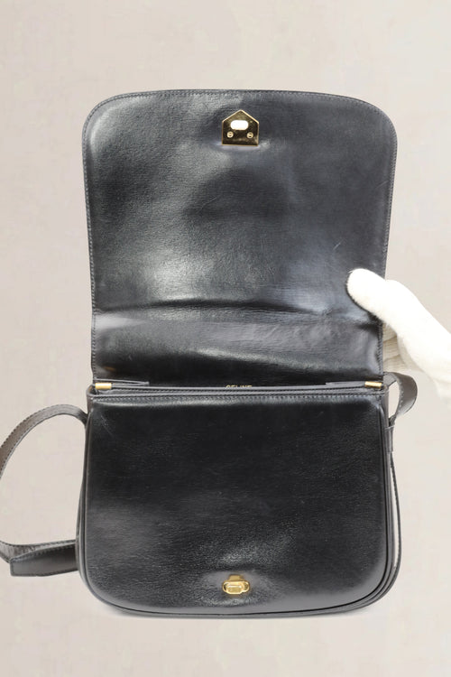 Sac à bandoulière vintage Céline en cuir noir avec fermoir doré