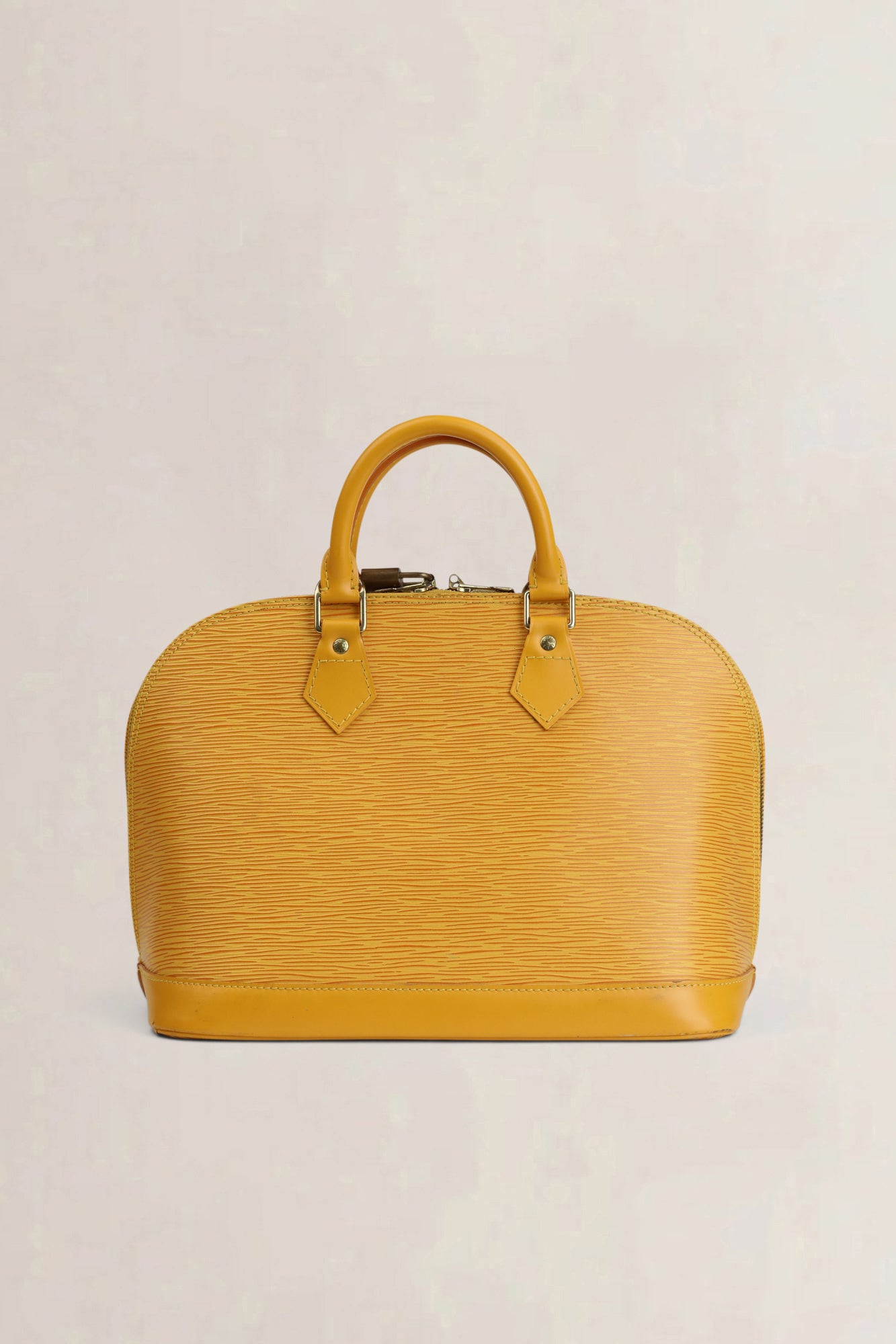 Sac à main Louis Vuitton Alma en cuir épi jaune