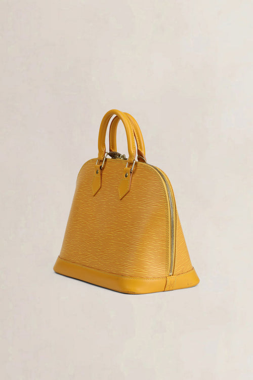 Sac à main Louis Vuitton Alma en cuir épi jaune