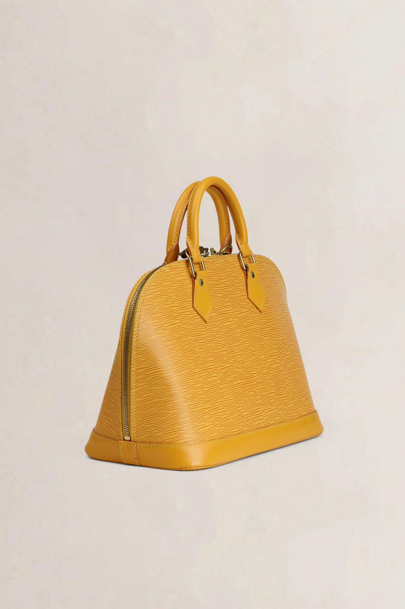 Sac à main Louis Vuitton Alma en cuir épi jaune