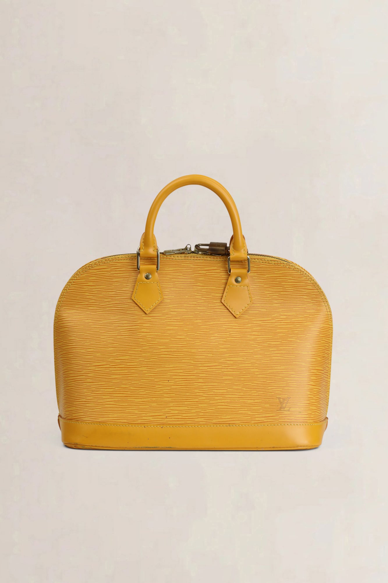 Sac à main Louis Vuitton Alma en cuir épi jaune