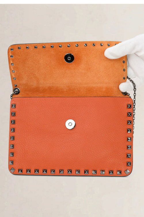 Valentino Garavani Orange Rockstud Crossbody Bag