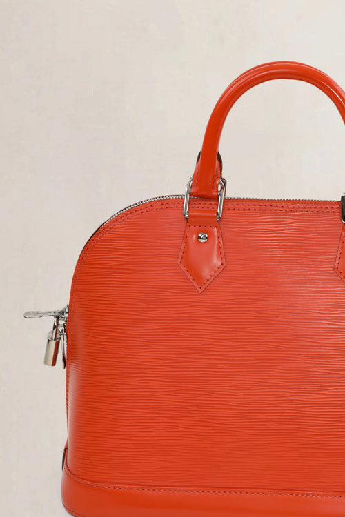 Louis Vuitton Orange Alma PM Epi Leder Top Handle Bag