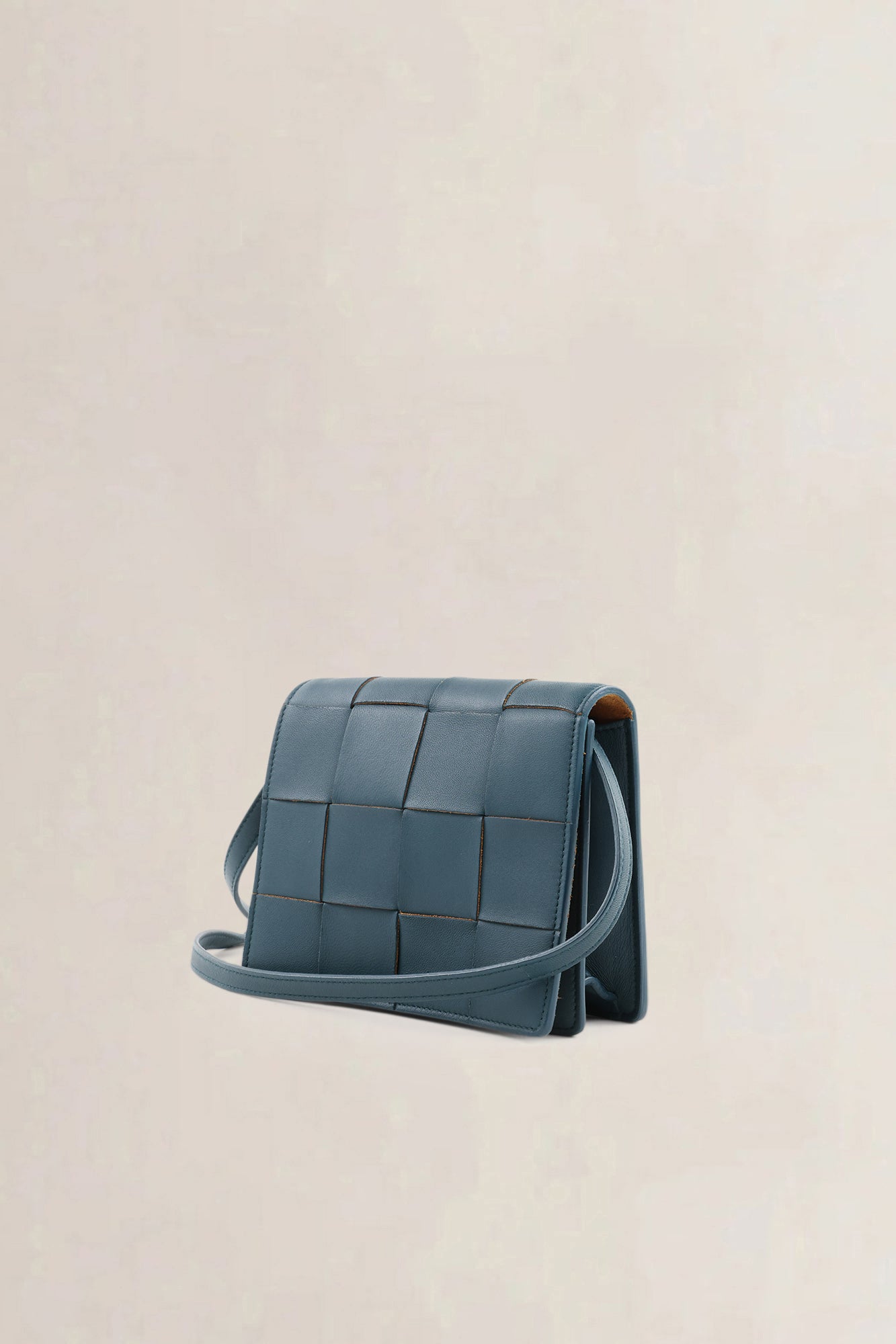 Bottega Veneta Mini Cassette crossbody in petrol blue intrecciato leer