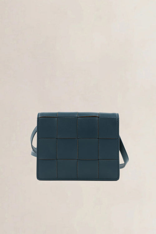 Bottega Veneta Mini Cassette crossbody in petrol blue intrecciato leer