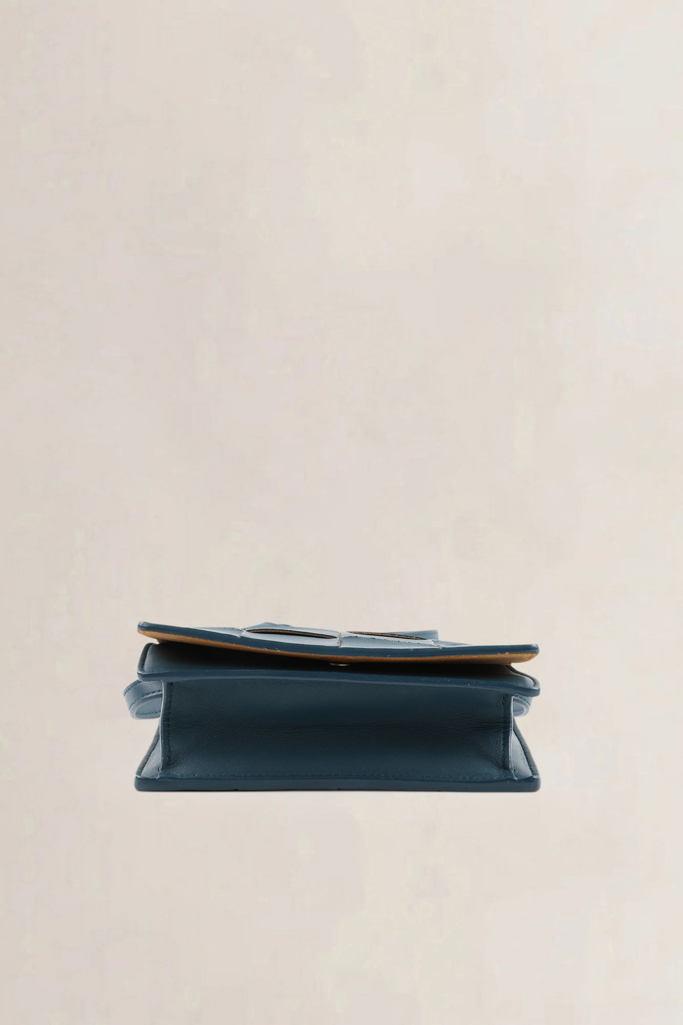 Bottega Veneta Mini Cassette crossbody in petrol blue intrecciato leer