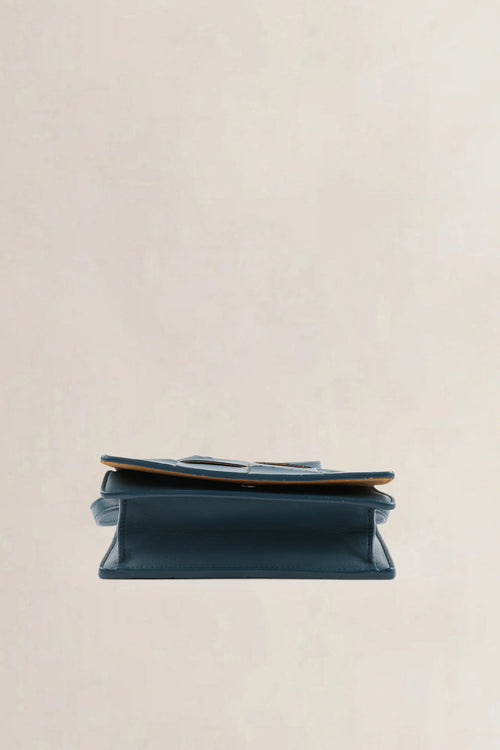 Bottega Veneta Mini Cassette crossbody in petrol blue intrecciato leer