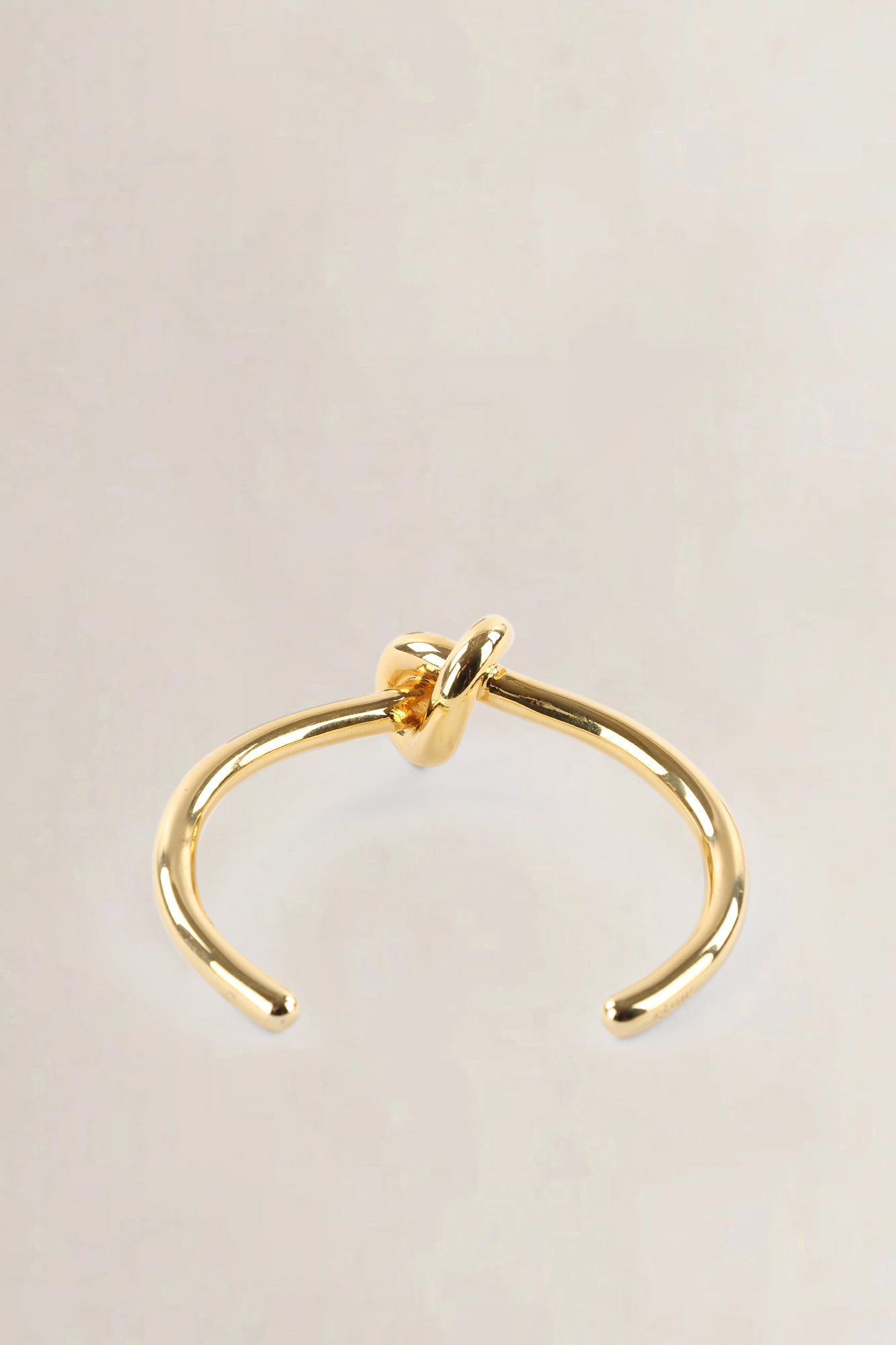 Celine Gold Tone Knot Bracelet