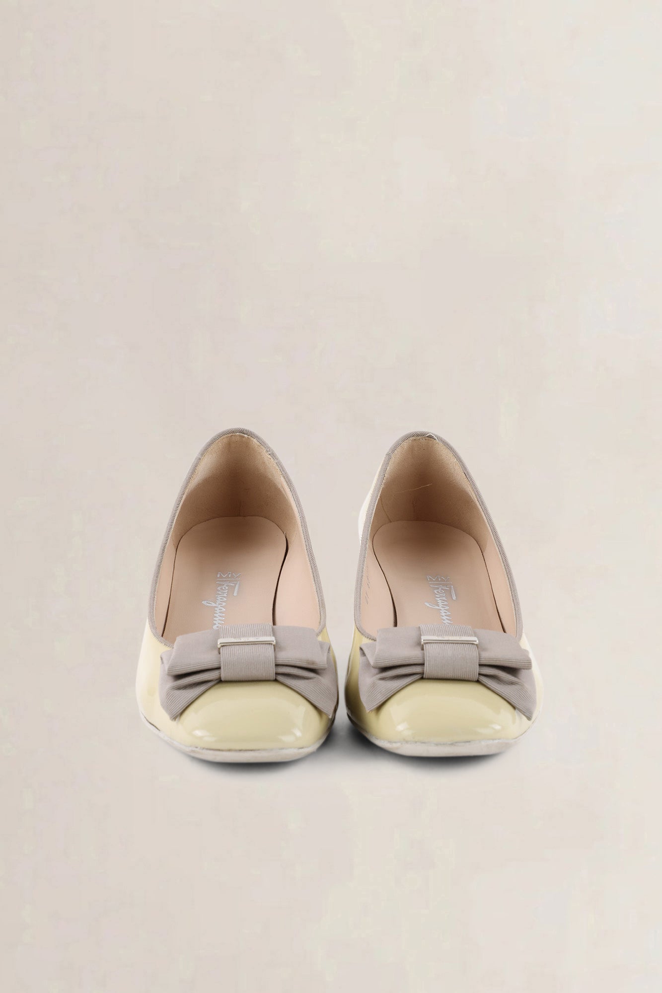 Salvatore Ferragamo Yellow Patent Leather Bow Pumps