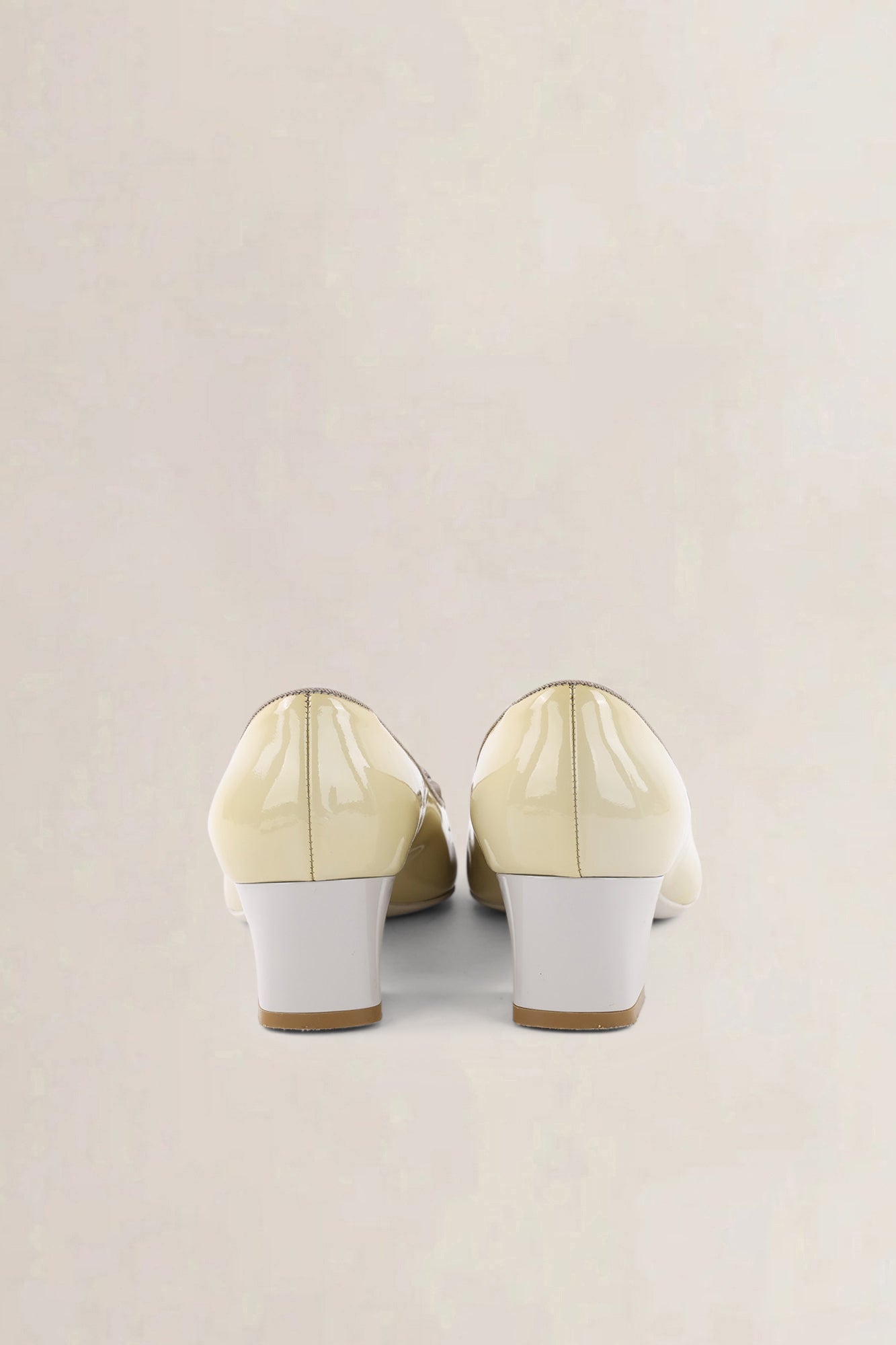 Salvatore Ferragamo Yellow Patent Leather Bow Pumps
